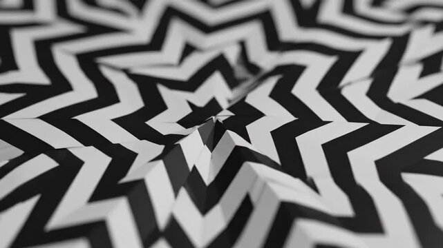 Folded paper black and white zigzag pattern creating optical illusion