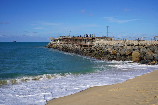 Construction work on a new pier on Iracema beach, with numerous vendor stalls and other amenities for beachgoers. Fortaleza - Cear&aacute;, Brazil. 