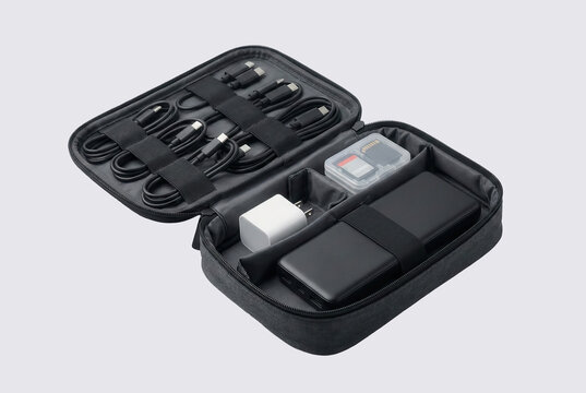 Open electronics organizer with cables and power bank layout