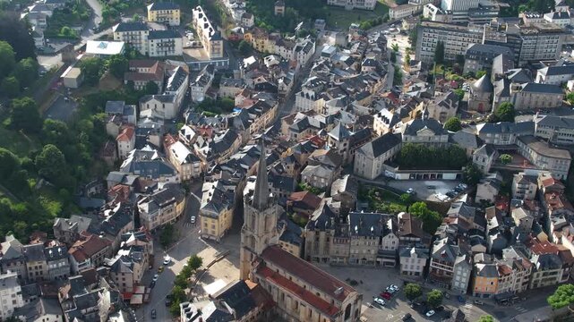 An aerial view around the old town in the city Tulle on a sunny summer afternoon in France.