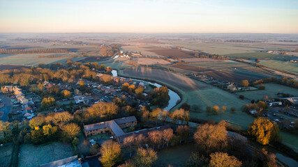 Rural farmland and English village town, Lincolnshire. Sunset in the countryside
