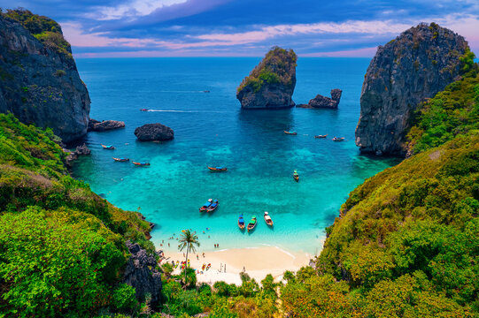 Nui beach and long tail boat in Phi Phi Don island, Krabi, aerial top view. Concept landscape tropical paradise of Thailand, travel Phuket