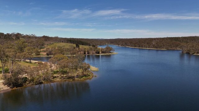 Barossa Reservoir Reserve, Williamstown, South Australia &ndash; 4K aerial drone footage of Whispering Wall dam, blue reservoir lake and surrounding forest landscape