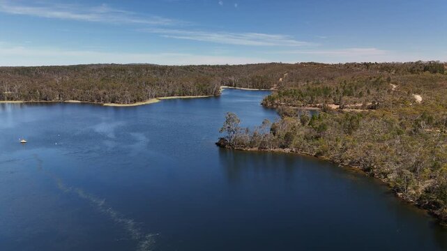 Barossa Reservoir Reserve, Williamstown, South Australia &ndash; 4K aerial drone footage of Whispering Wall dam, blue reservoir lake and surrounding forest landscape