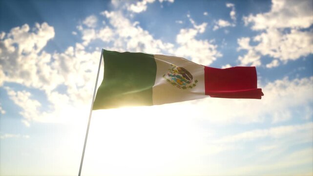Mexico Flag Waving Under Sunlight with Blue Sky &ndash; Vibrant National Symbol of Mexican Identity