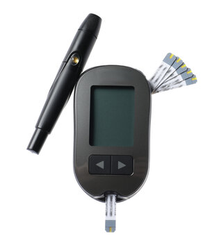 Diabetes. Digital glucometer, test strips and lancet pen isolated on white