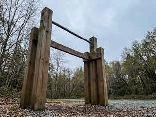 Outdoor Fitness Trail Station With Wooden Pull-Up Bars In A Park