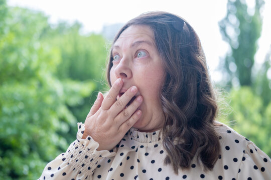 close up portrait shocked mature woman with bulging eyes, surprised facial exaggerated expression, emotional reaction, disbelief, astonishment, surprise and disbelief humor, unexpected discovery