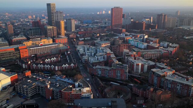 Aerial video of Birmingham city centre and skyline at golden hour.
