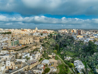 Obraz premium Aerial view Historic Massafra Castle: Medieval Fortress Byzantine Rock-Cut Architecture in Puglia’s Ravines. Top Italian Military Landmark Photography