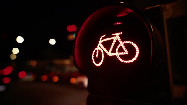 Bicycle Red Stoplight With Cars Passing Behind