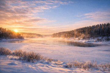 Fototapeta premium Frozen river landscape at winter sunrise with soft golden sunlight and mist rising above icy water. 