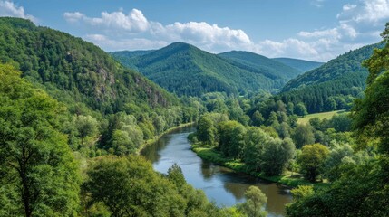 Naklejka premium Serene Landscape of Lush Green Hills and Calm River Under Bright Sky