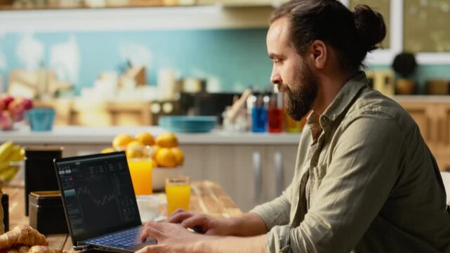 Stockbroker at home, day trading fluctuations, monitoring market trends, candlestick charts on laptop used to check research risk for investments. Stock exchange analysis, crypto currency profit.