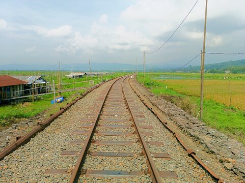 ANTIQUE TRAIN RAILS ALONG RAWA PENING LAKE IN THE AMBARAWA OLD TRAIN STATION AREA