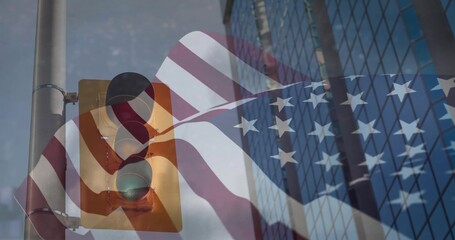 Naklejka premium Sweeping US flag overlay stretching across downtown road, showing green signal and glass building