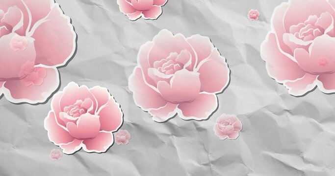 Showing large, small stylized pink roses on crumpled gray paper, with white outlines, soft shadows
