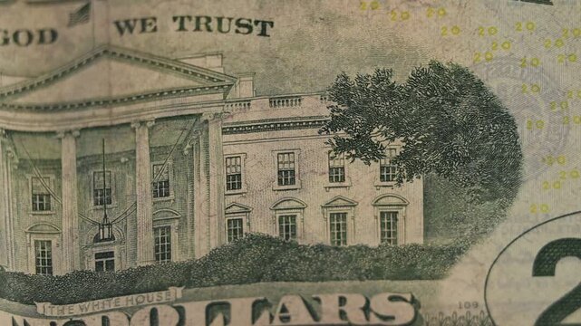 Rotating close-up of an old $20 US dollar bill, highlighting the intricate and aged details.