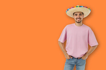 Cinco de Mayo, Man wearing a sombrero stands smiling and showing joy © Atlas