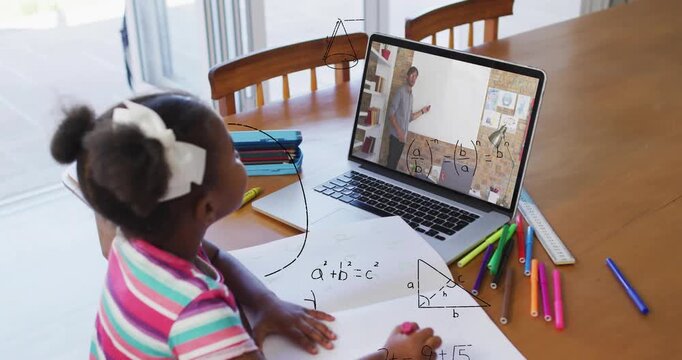 Girl doing work at table, laptop teacher teaching math starting overlays over notes helping solve