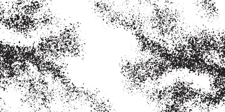 Abstract textured background with black and white speckles.