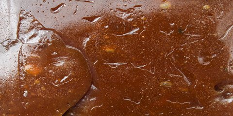 the texture of traditional dodol food is dark brown