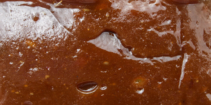 the texture of traditional dodol food is dark brown