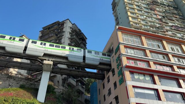 March 10, 2026, at the Liziba Light Rail Station in Yuzhong District, Chongqing, China&mdash;a renowned sight of the city's rail transit passing through a building.