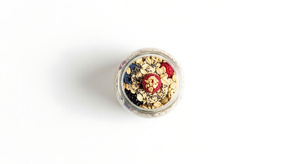 Healthy Breakfast Cereal Granola Mix in a Jar Overhead Shot on White Background