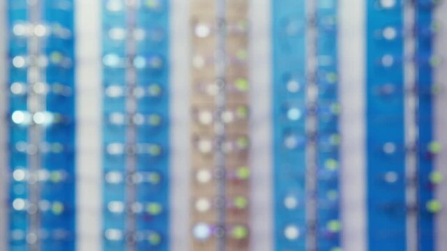 Blurred display of eyeglasses in eyewear store