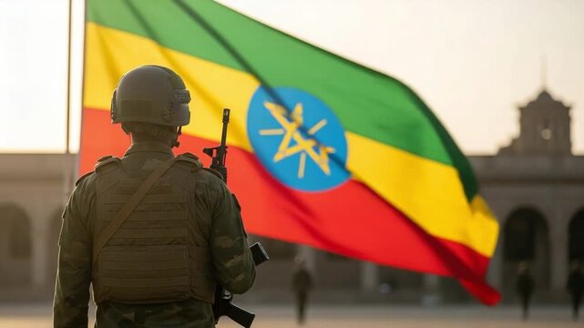 Ethiopian soldier in military uniform and helmet, holding a rifle, standing with the vibrant national flag of Ethiopia waving proudly, symbolizing national pride and security.