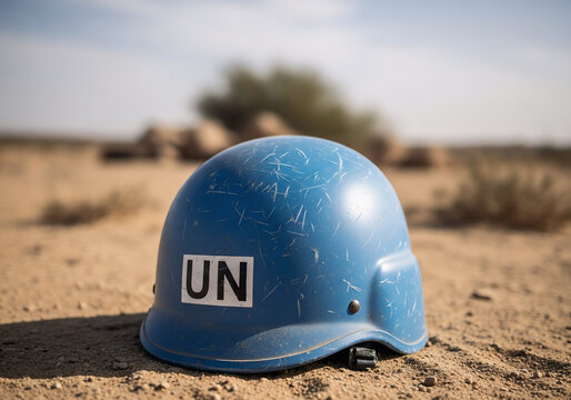 Worn Blue Protective Military Style UN Helmet on Desert Landscape 