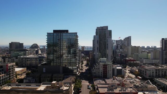 Aerial drone view of downtown San Diego, California featuring Petco Park stadium and the San Diego&ndash;Coronado Bridge. Urban skyline and waterfront cityscape of San Diego with modern buildings and harbor