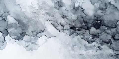 A frozen winter scene captures the cold texture of ice on the river, rocks, and water beneath a bright blue sky with soft white clouds © ZT Stock Studio