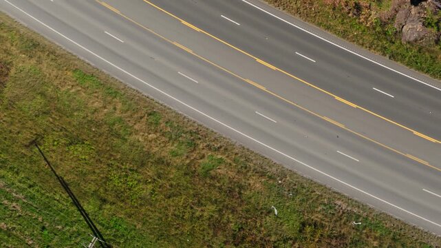 Above View Of Cars Driving Over US Highway 270 Near Jones Mill Quarry In Hot Spring County, Arkansas, USA. Aerial Topdown Shot