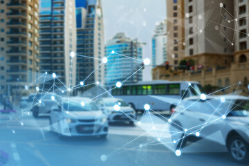 Traffic moves through a city with buildings in the background and data lines overlay