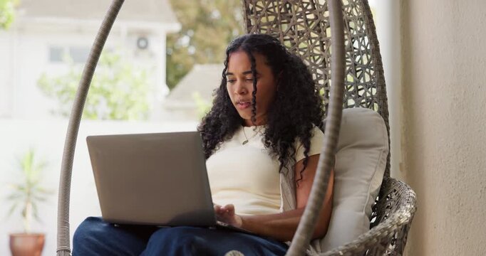 Thinking, student and woman with laptop, swing and search for university funding, learning or online. Home, reflection and person with tech for scholarship application, education and typing research