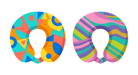 Two colorful travel pillows with abstract geometric patterns are displayed