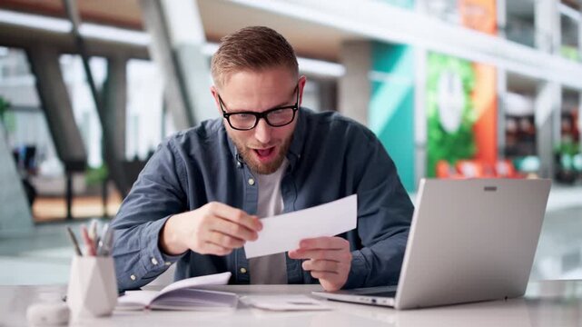 Businessman Happily Holding Paycheck