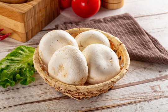 Raw white champignon mush heap