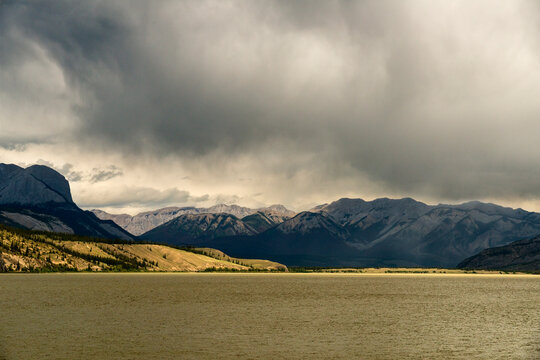 Canada, Alberta.  Clouds over lake in Jasper National Park