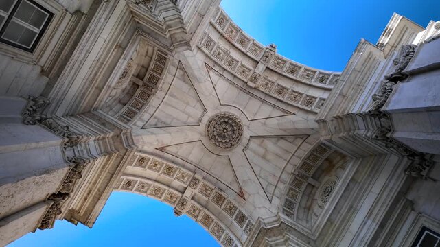 Looking up at the historic Augusta Street Arch ceiling in Lisbon