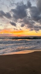 Fototapeta premium Beach sunset waves. stunning bright colorful sky, seascape. High quality 4k footage