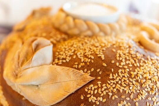 Wedding bread - loaf (cake). Wedding bread. A loaf is decorated with flowers, stables, ears of dough. A wedding tradition