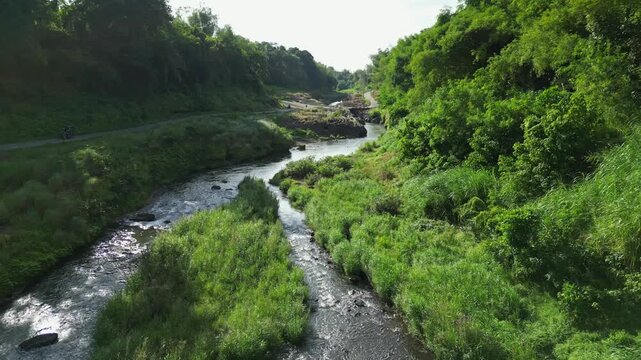 Forward drone movement above Bucal Tulay river revealing endless flowing water at Maragondon Cavite Philippines