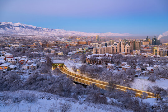 A view of Kazakhstan's largest city, Almaty, from Mount Kok Tobe early in the morning after a snowfall.