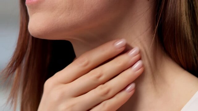 Throat And Salivary Gland Disorders. Woman Experiencing Neck Pain