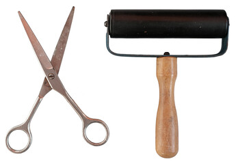 Rubber roller and metal scissors isolated. Collage elements, scrapbooking, and creative paper cut...