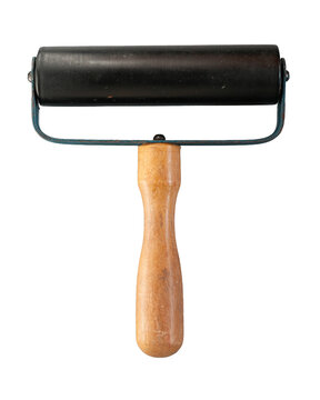 Brayer or rubber pressure roller, isolated. Hand roller tool. Collage element rubber roller, scrapbooking, and creative compositions.