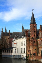 Obraz premium Historic Bruges Canal with Brick Medieval Buildings